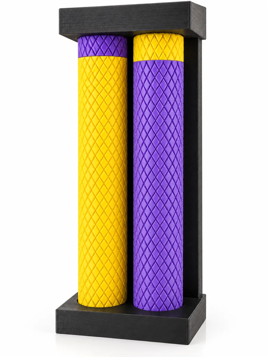 Gold case with purple cap and purple case with gold cap in a two-place stand